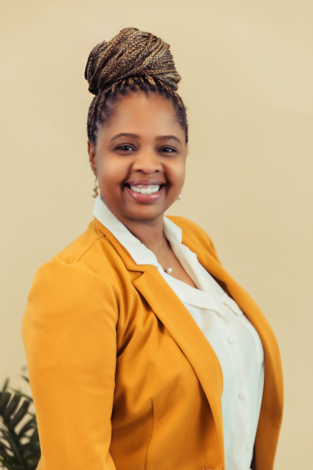Professional headshot of Medria Buford